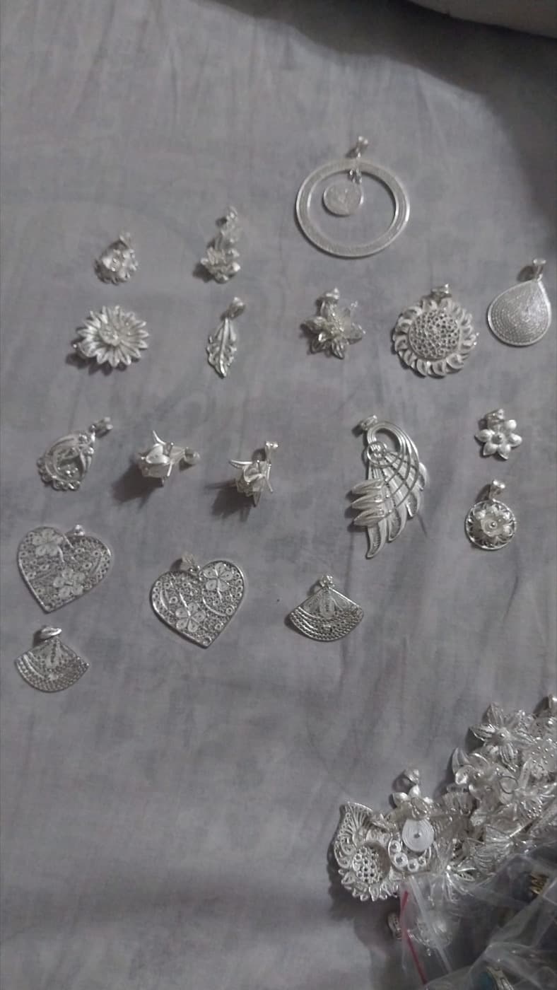 Silver pendants and charms