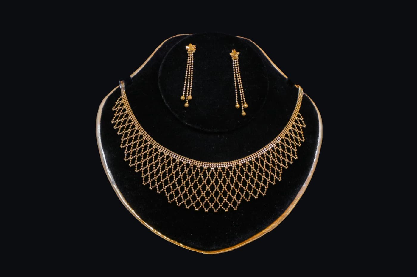 Gold necklace and earring set